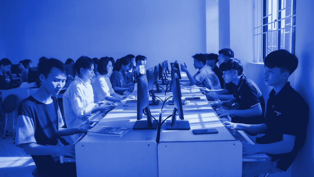 Students working at computers in a college lab
